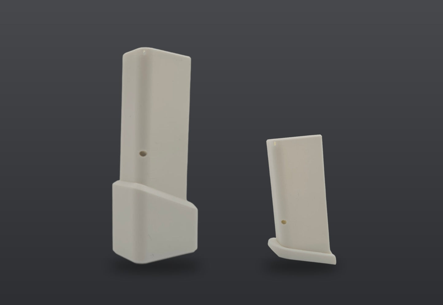GK Series dummy magazines, TTI Extended on the left and Flush on the right