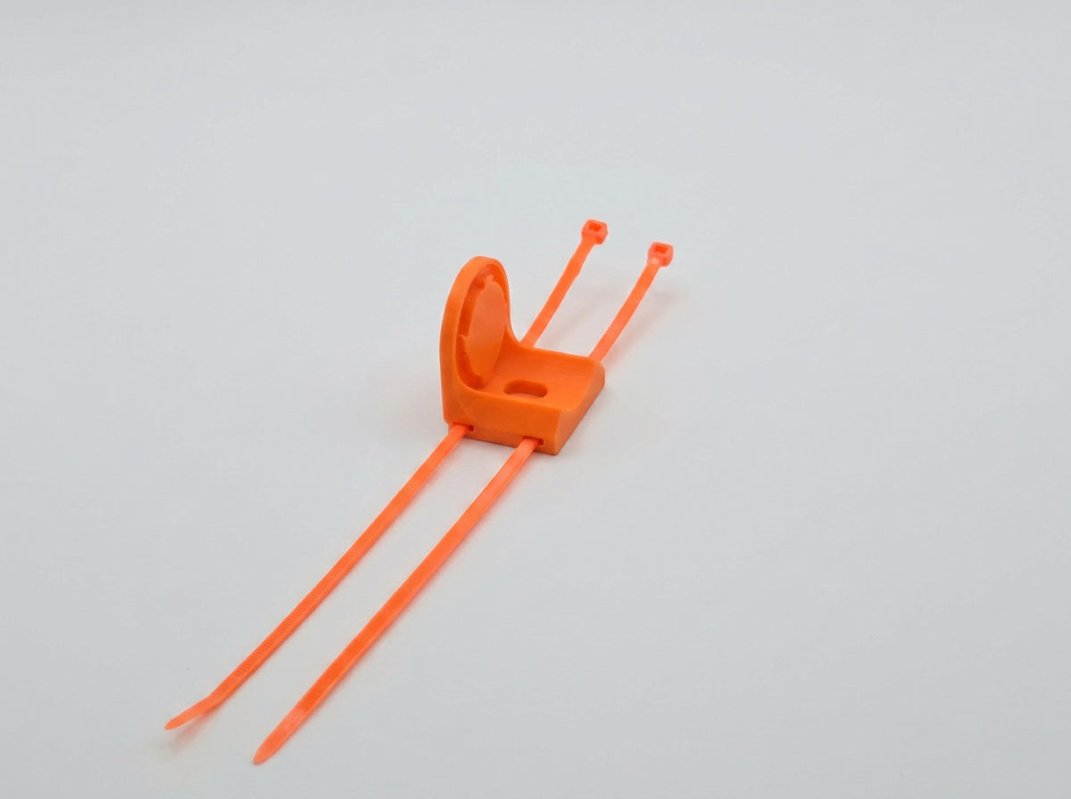 Paster Companion Wall/Stick Mount bracket with two orange zip ties